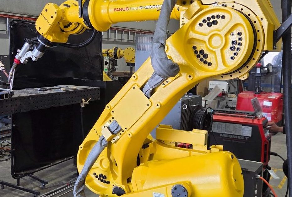 A refurbished FANUC arm welding on the bench in Delta Automation's Rutherford workshop